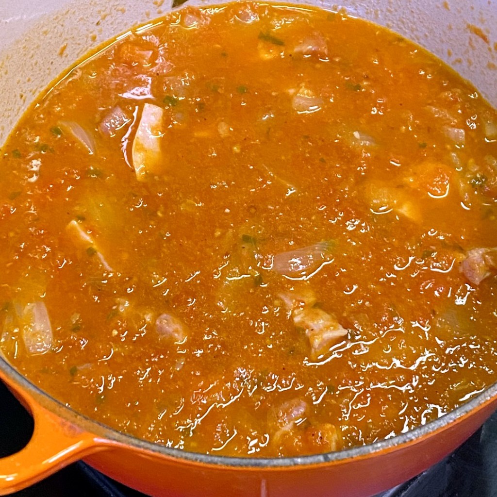 Ajout des tomates dans le sofregit